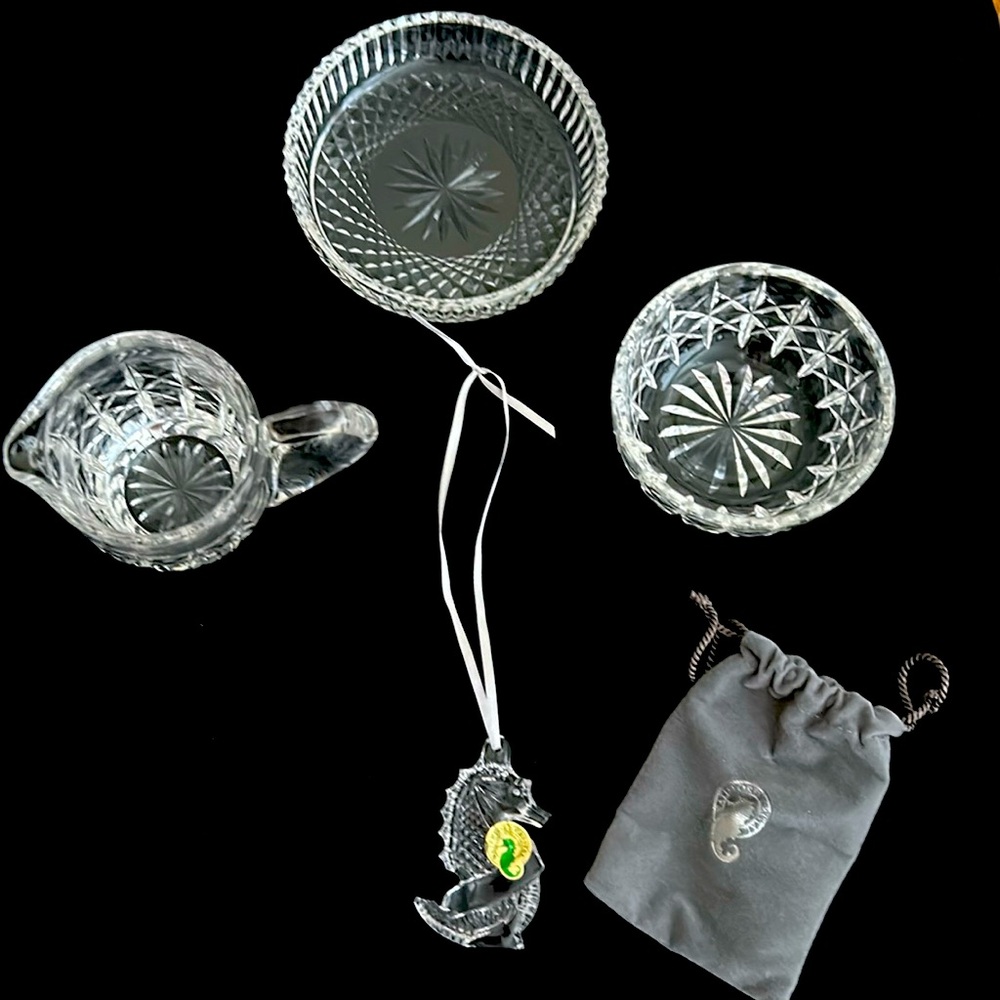 Group of 4 Waterford Crystal pieces.
